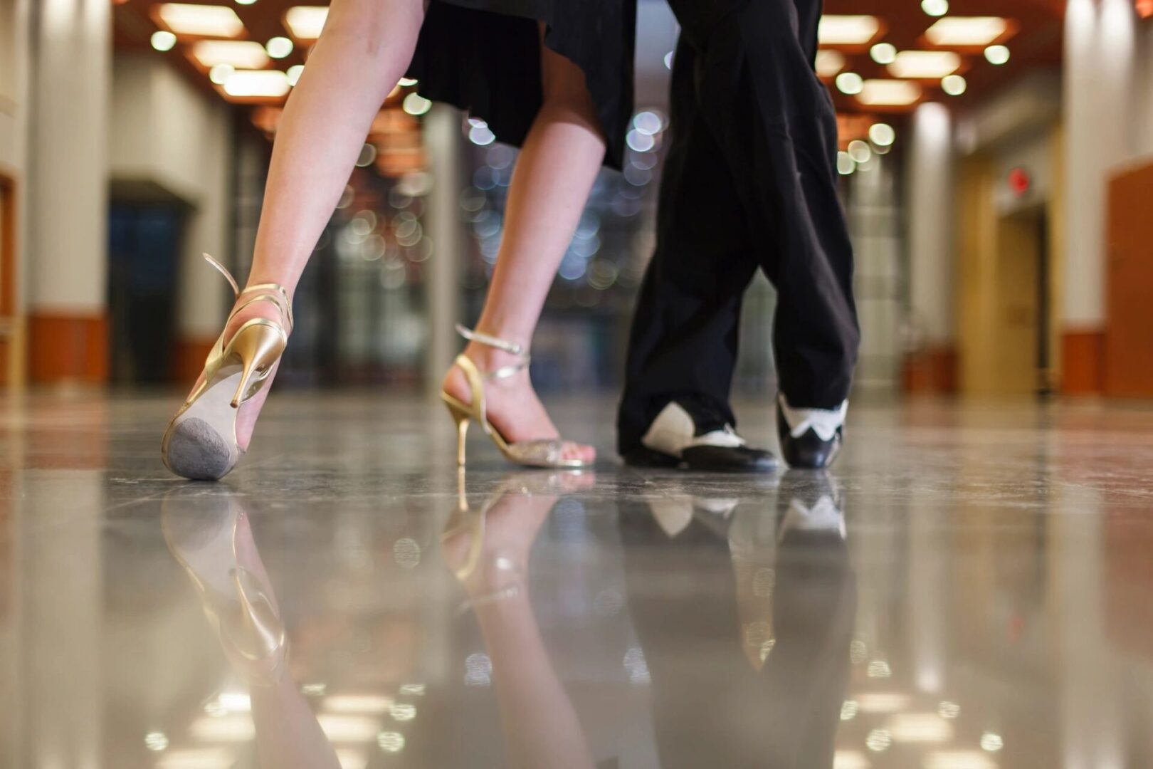 Ballroom latin salsa dancers dancing couple in modern sport dance show