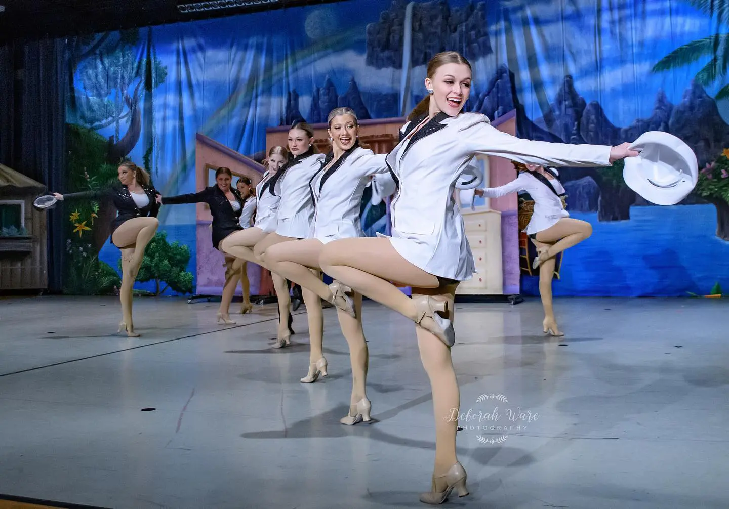Dancers in SUits and Cream Color Tights Dancing on the Stage