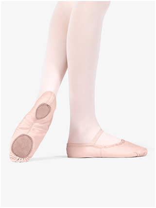 A Girl in Ballerina Shoes and Stockings on White Background