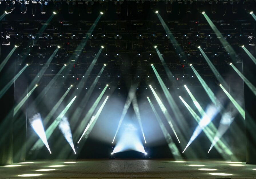 A stage with lights and a light show.